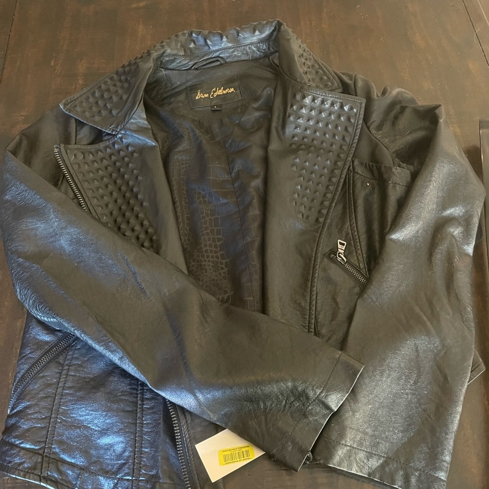 No defects NWT. Women’s large motorcycle punk rock jacket